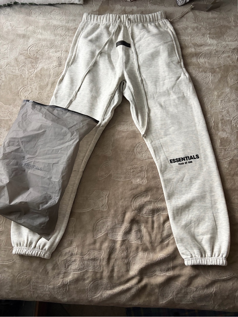 Fear of God ESSENTIALS Light Oatmeal Sweatpants with Logo (Cuffed)